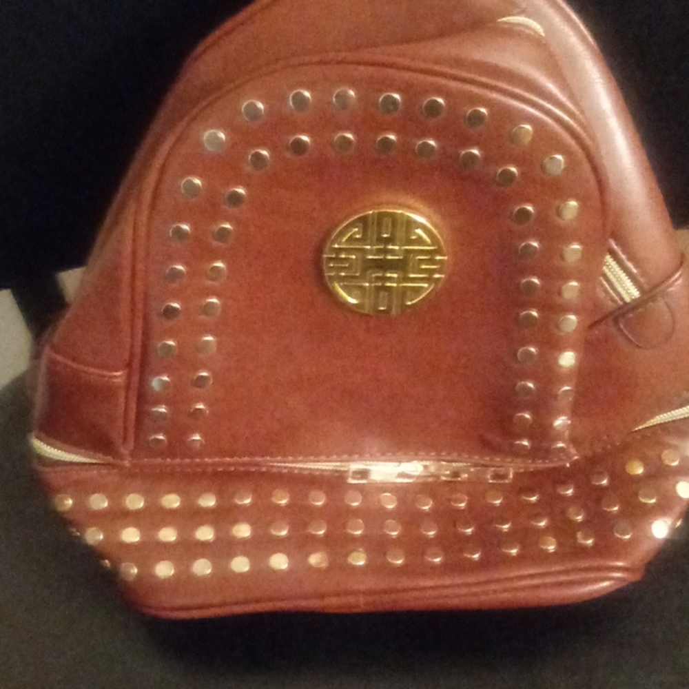Women leather backpack brown